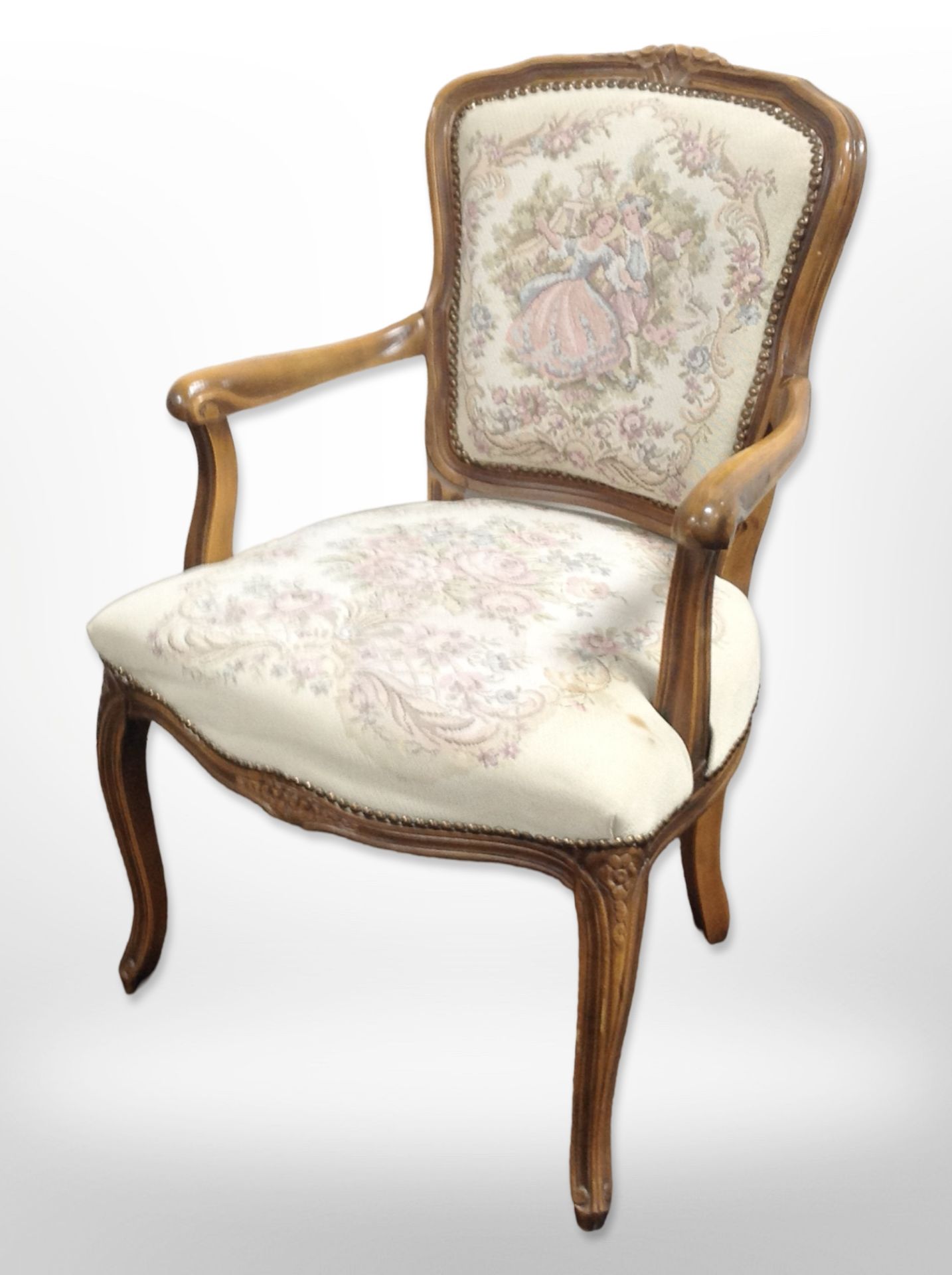 A Continental walnut salon armchair,