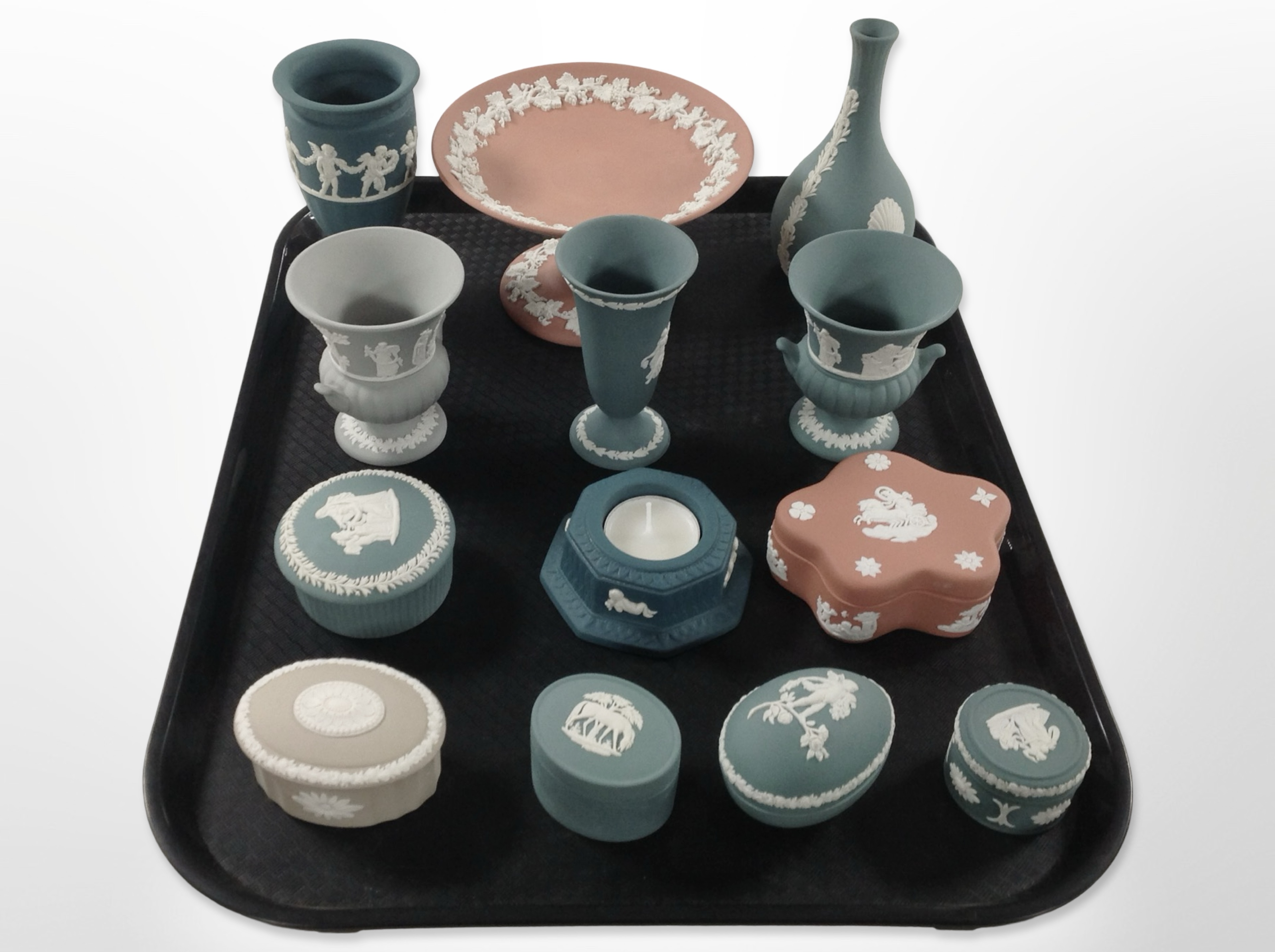A collection of Wedgwood Jasperware cabinet china in various colours.