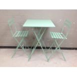 A contemporary painted metal folding garden table,