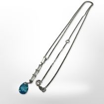 A 9ct white gold pendant set with synthetic stones suspended on 9ct white gold chain