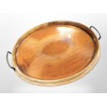 A walnut twin-handled oval serving tray,