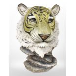 A large case resin bust of a tiger head,