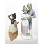 A Nao bisque porcelain figure of a girl carrying a basket of flowers,