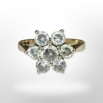 A 9ct yellow gold cluster ring set with synthetic stones,