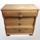 An early 20th century Scandinavian pine four drawer chest,