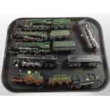 A group of diecast metal and plastic locomotives and coal tenders including Franklin Mint precision