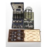 A group of boxed cutlery sets including grapefruit spoons, cutlery sets etc,