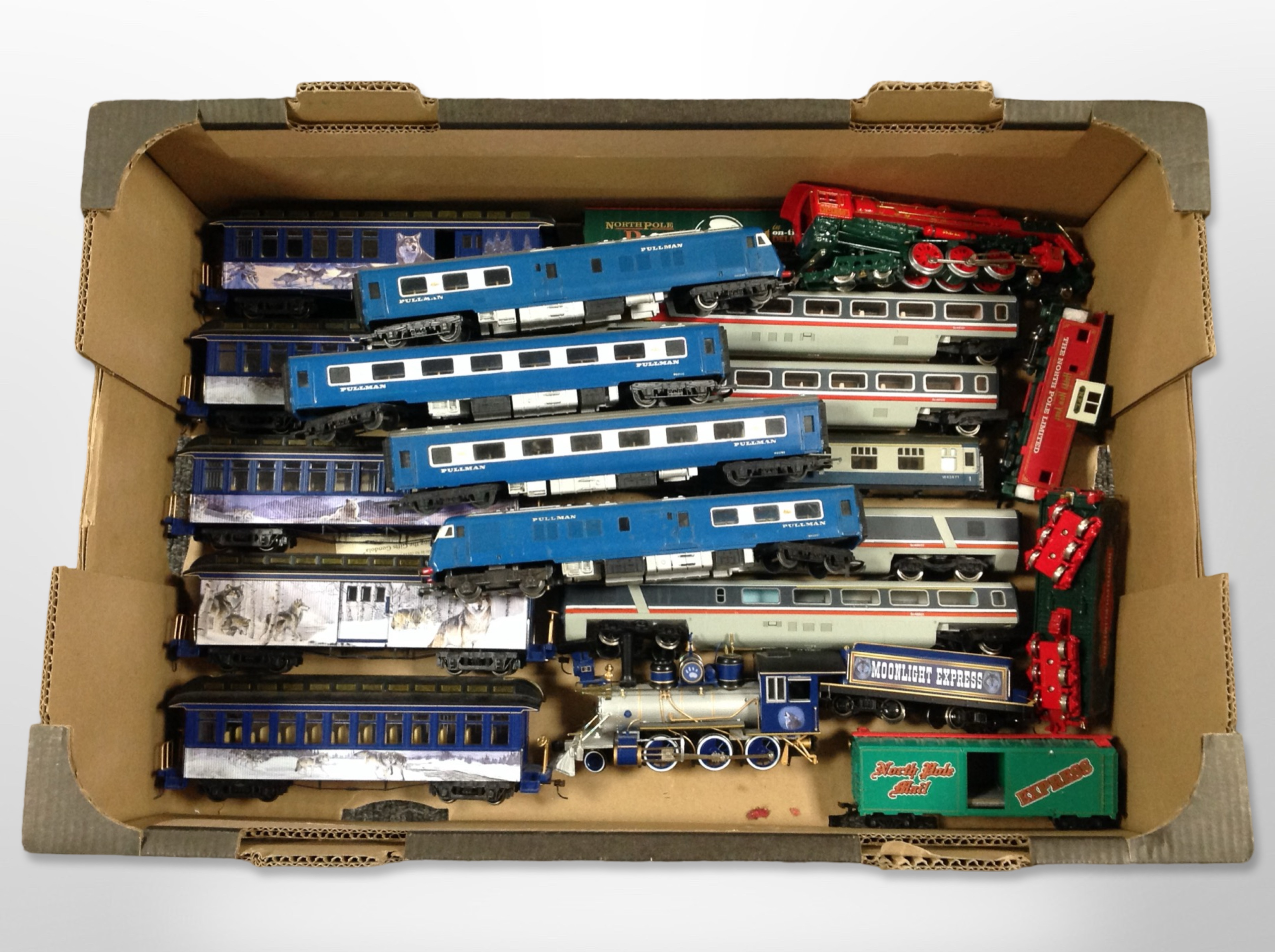 A collection of 00 gauge locomotives and passenger cars, including Tri-ang, Franklin Mint, Bachmann,