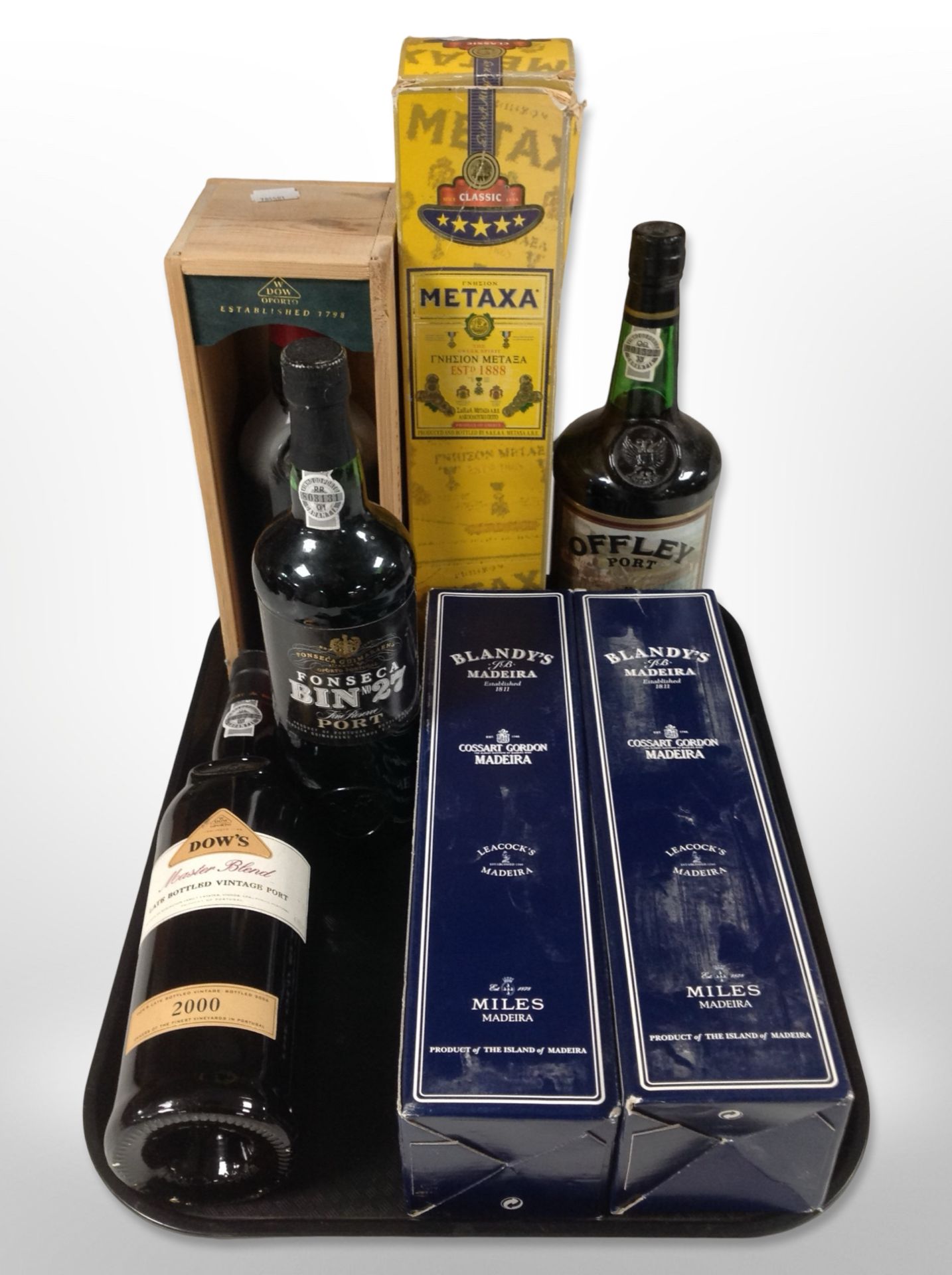 Two bottles of Blandy's madeira, further bottles of Dow's vintage port 2000, Fonseca port, etc.