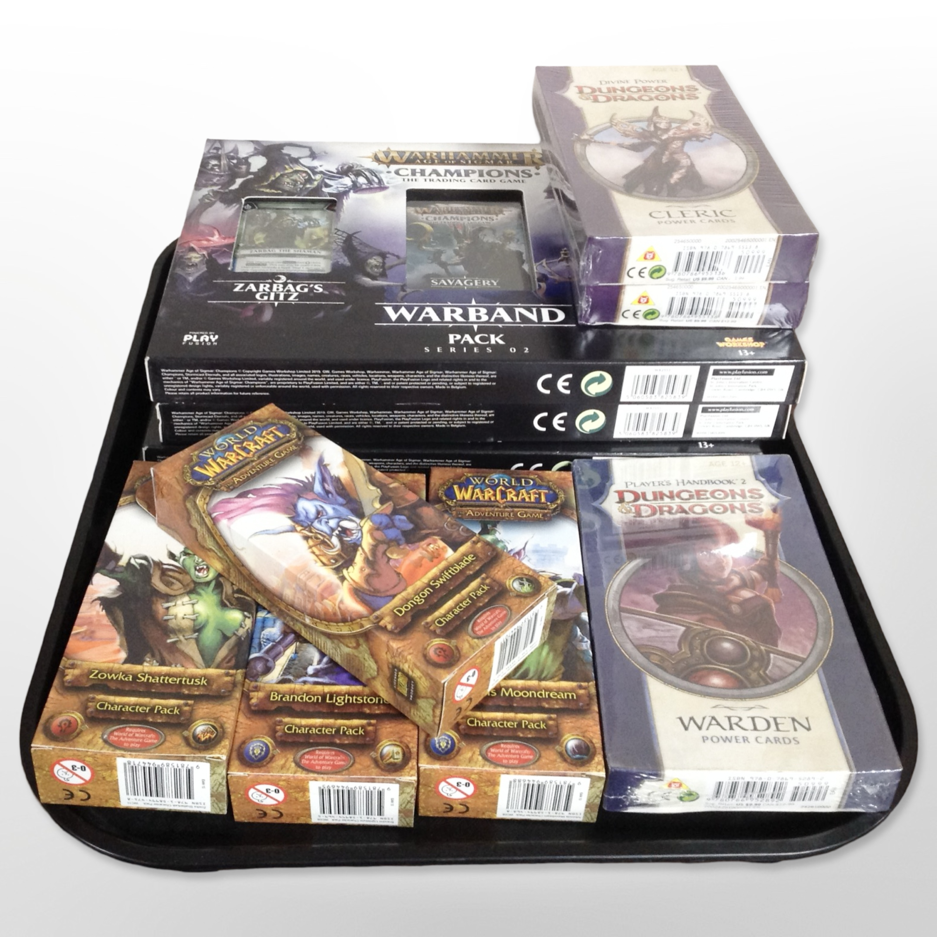 Three Warhammer Age of Sigmar Champions Trading Card Game packs,