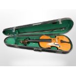 A violin with two-piece back, length 14 inches, together with a bow, in an antique wooden box.