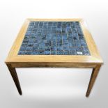 A 20th century Danish tiled square lamp table,