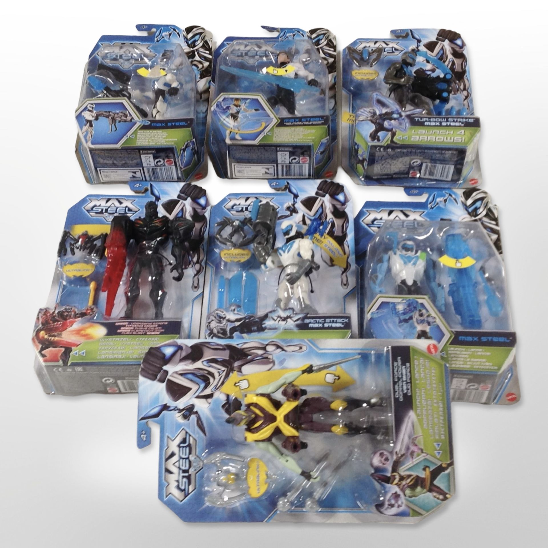 Seven Mattel Max Steel figurines, boxed.