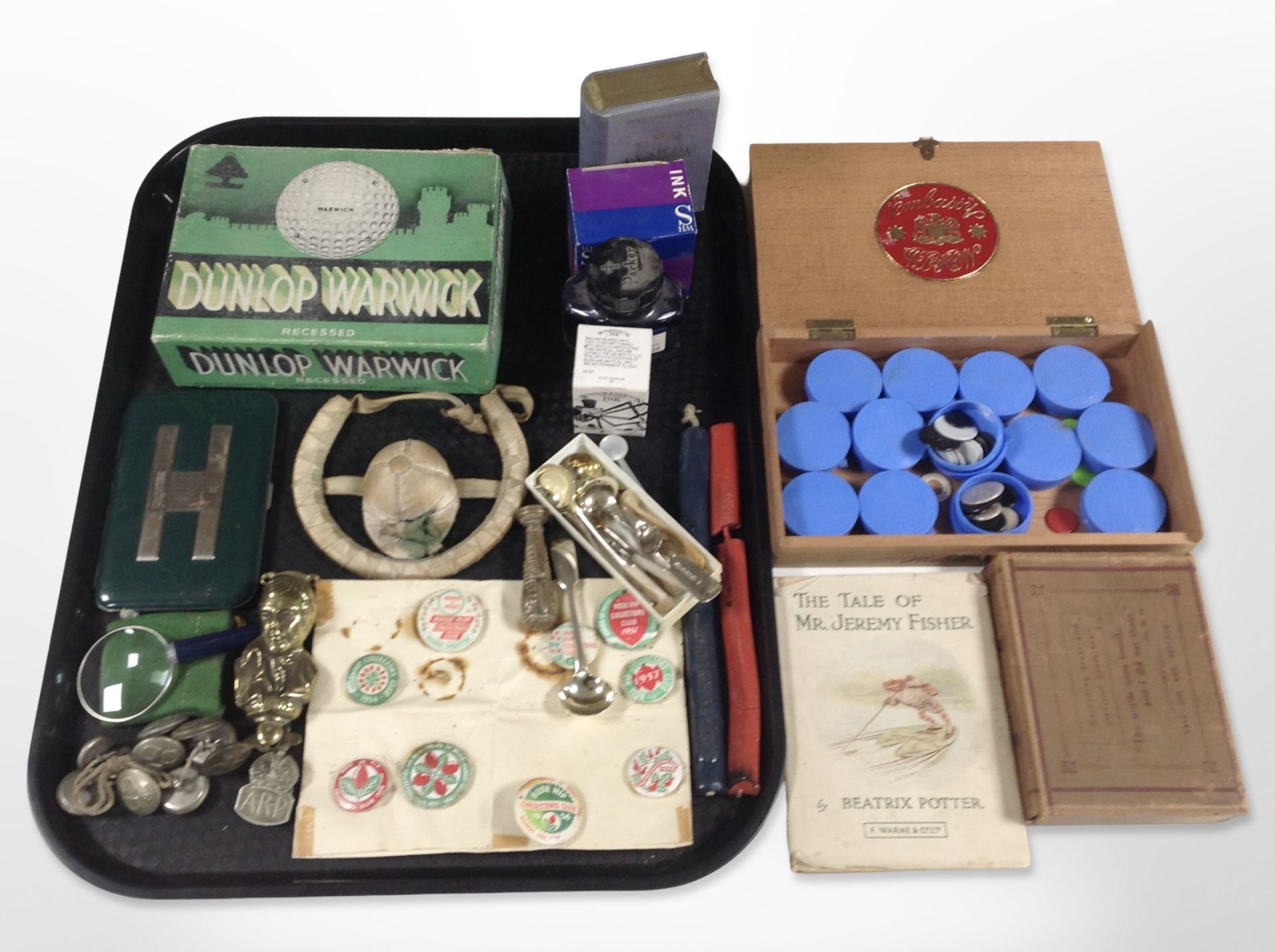 A group of miscellaneous items including sealing wax, Parker pen ink, buttons, an ARP badge,