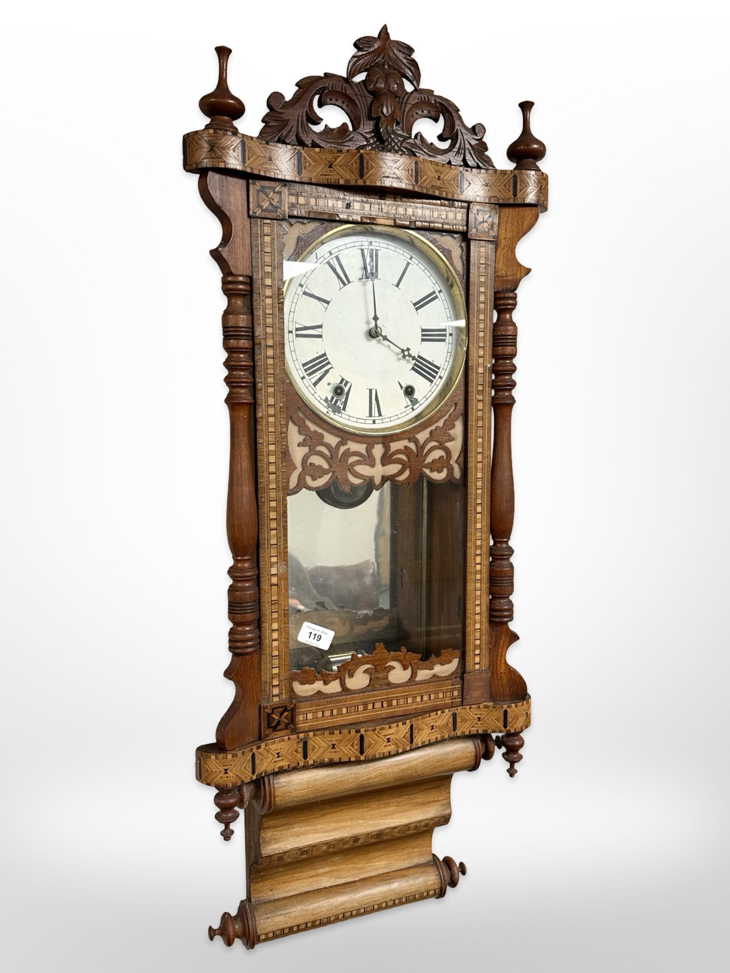 A 19th-century parquetry wall clock with pendulum, height 103cm.