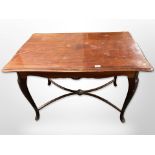 An early 20th century mahogany serpentine occasional table,