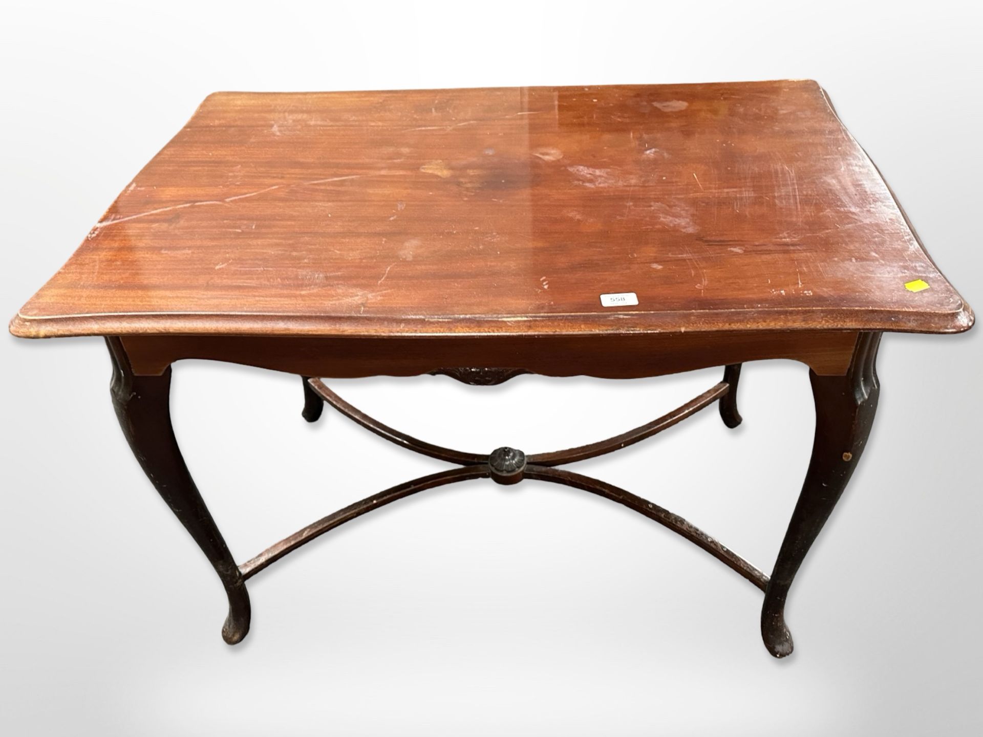 An early 20th century mahogany serpentine occasional table,
