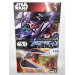 Two Hasbro Disney Star Wars models, Tie Striker and Tie Fighter, boxed.