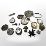 A group of antique silver brooches, baby's bangle, silver fob watch with key,