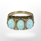 A 9ct yellow gold three stone opal ring, size O CONDITION REPORT: 3.2g.