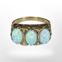 A 9ct yellow gold three stone opal ring, size O CONDITION REPORT: 3.2g.