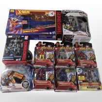 10 Hasbro figurines including Transformers and Iron Man, boxed.
