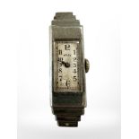 A lady's Art Deco 18ct white gold Rolex Princess wristwatch in stepped rectangular case,