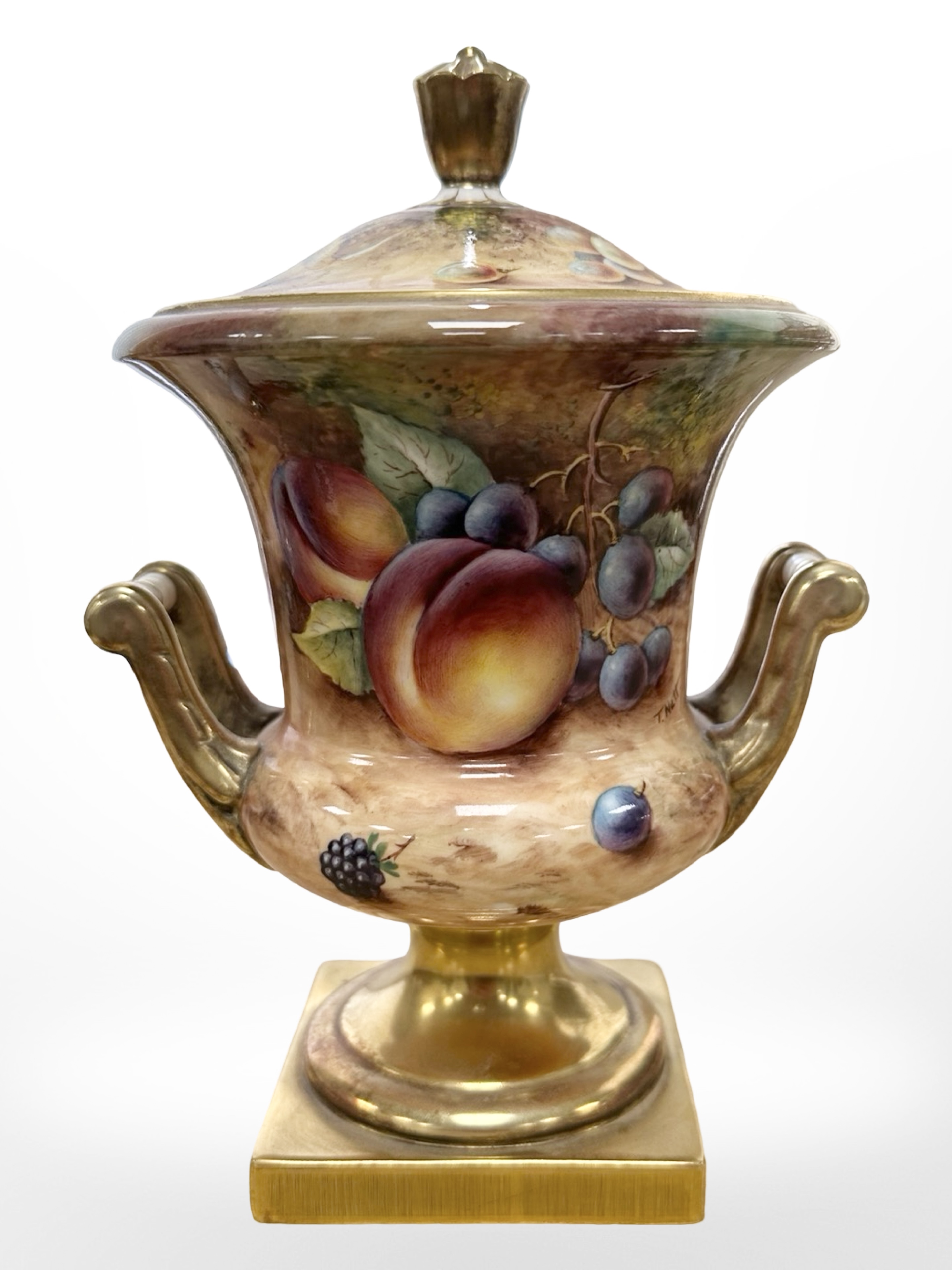 A Royal Worcester campana-shape lidded twin-handled urn, hand painted with fruit,