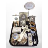 A mother of pearl-mounted crucifix, together with a group of portrait miniature prints,