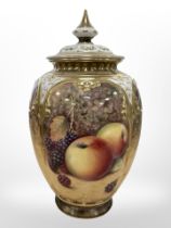 A Royal Worcester urn with cover, hand painted with fruit, black mark to base, numbered 169,