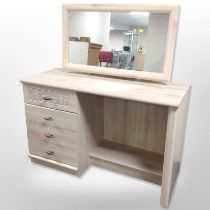 A contemporary pine-effect mirror back dressing table, 106cm wide x 43cm deep x 119cm high.