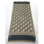 A decorative hand-stitched throw by Rosetex, 226cm x 99cm.