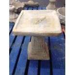 A square garden bird bath,