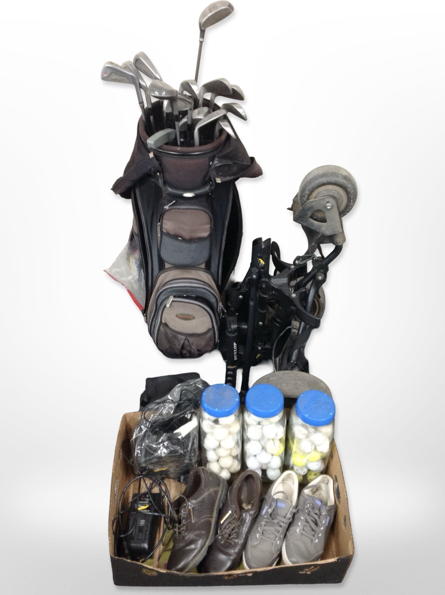 Golf equipment including electric trolley, bag containing Diawa and Dunlop irons, box of golf shoes,