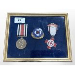 A framed medal montage 'Scottish Ambulance Service'