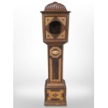 A parquetry-inlaid granddaughter clock, case height 128cm.