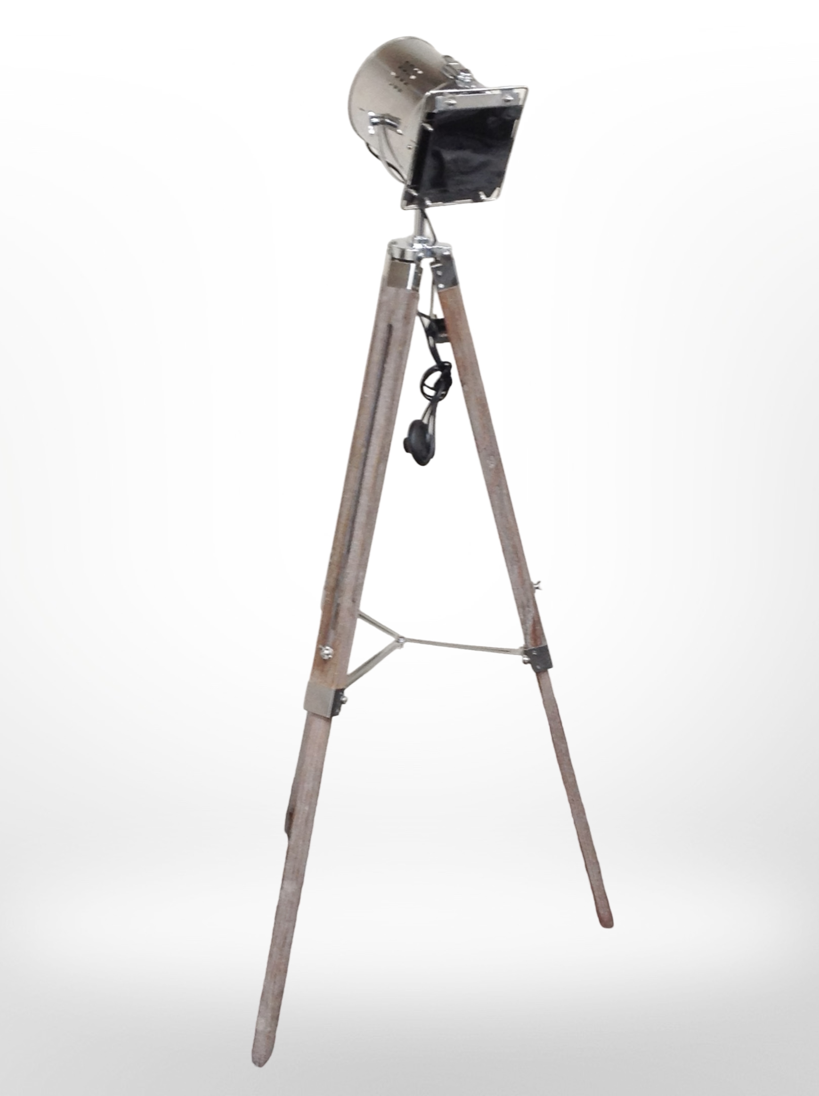 A contemporary chrome tripod spotlight, height 137cm.