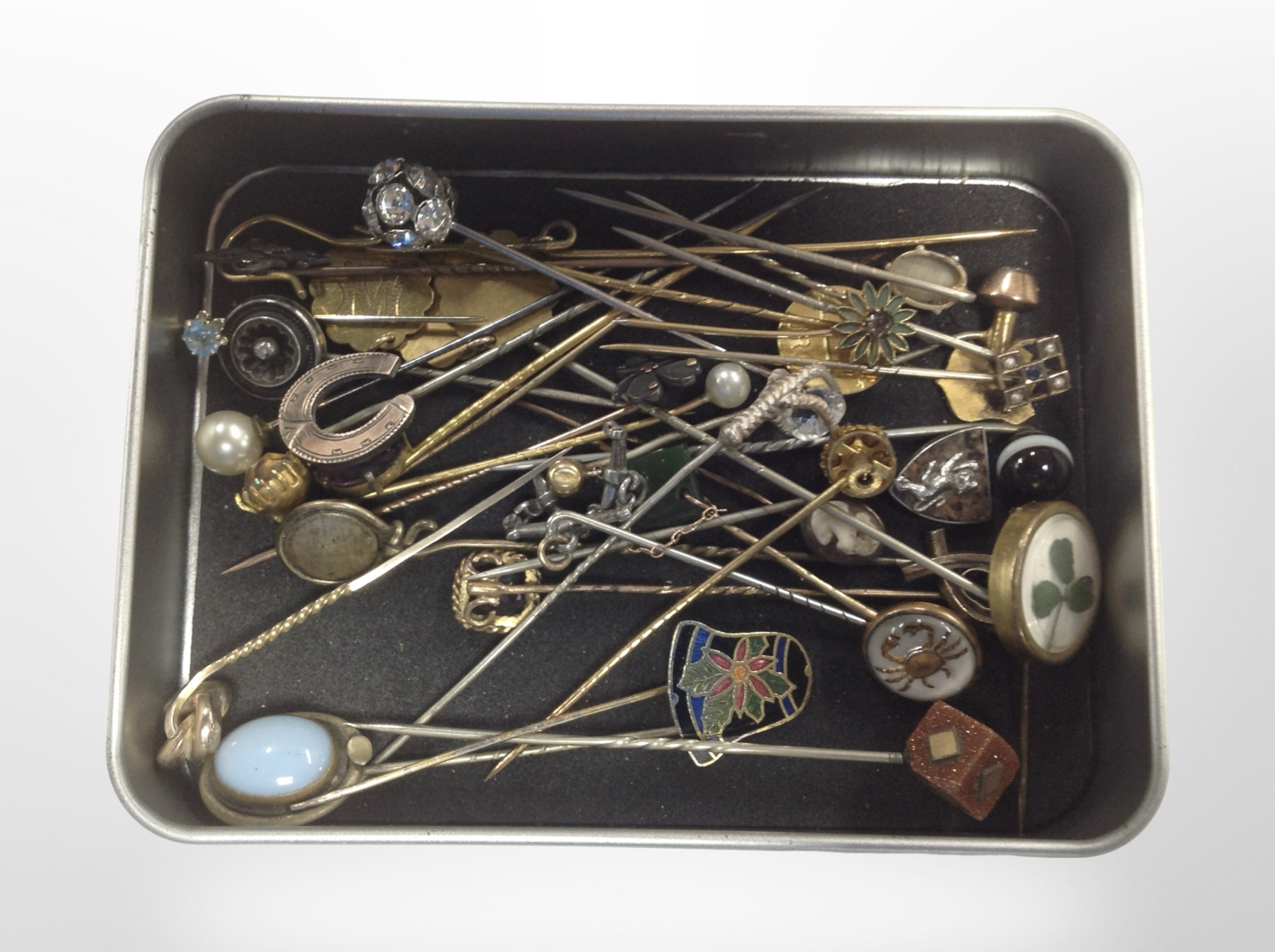 Approximately thirty various stick and hat pins