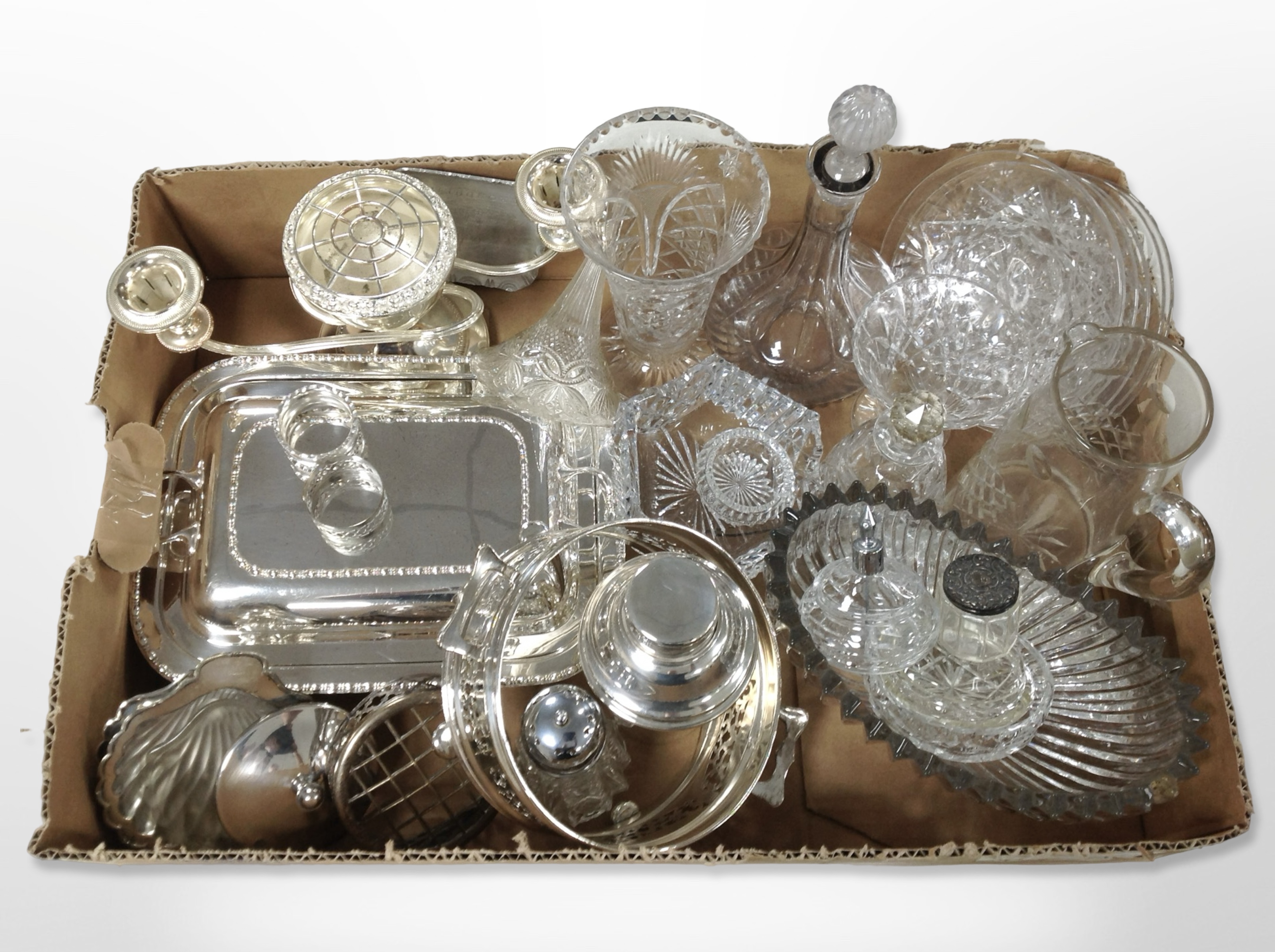 A collection of silver-plated wares including entrée dish with cover, table candelabrum,