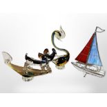 A collection of contemporary glass animal ornaments to include Murano dog, sailing boat ornament,