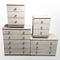 Four contemporary pine-effect chests, largest 77cm wide x 44cm deep x 92cm high.