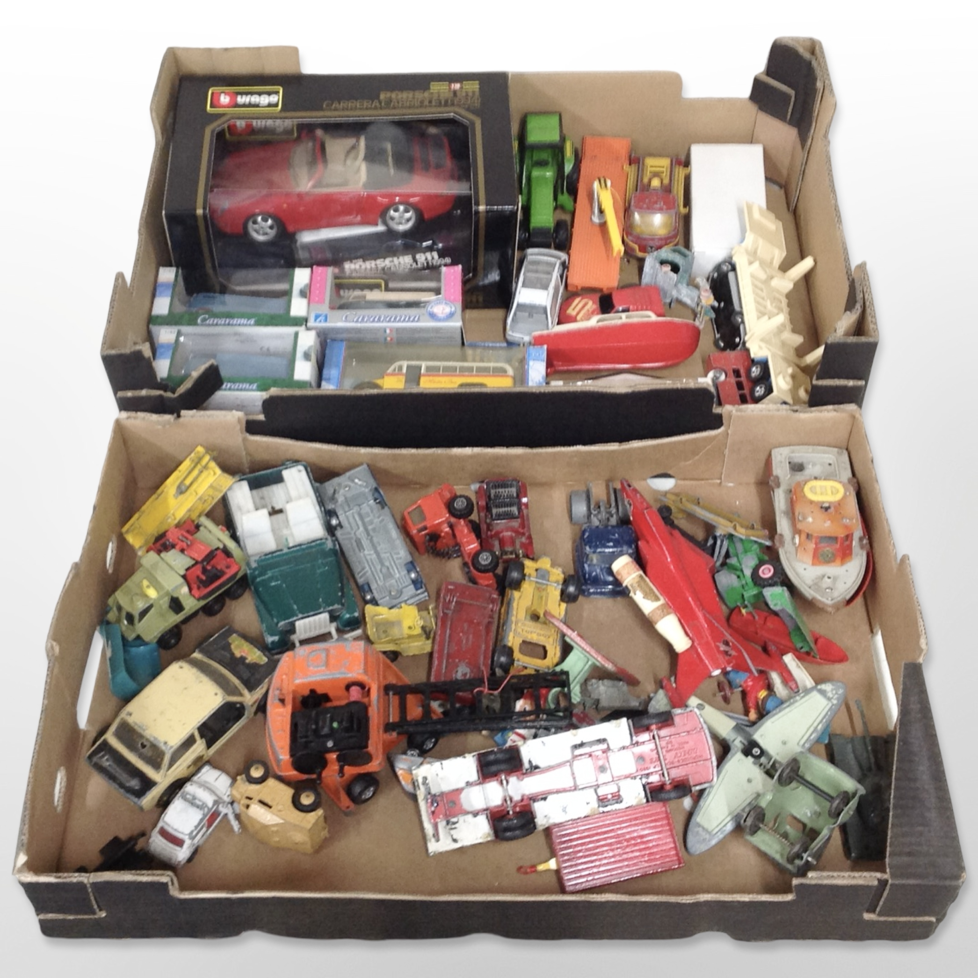 A group of 20th-century play-worn die-cast vehicles including Dinky.