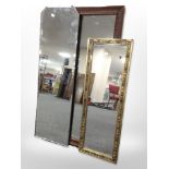 A carved oak-framed mirror, 100cm x 44cm,