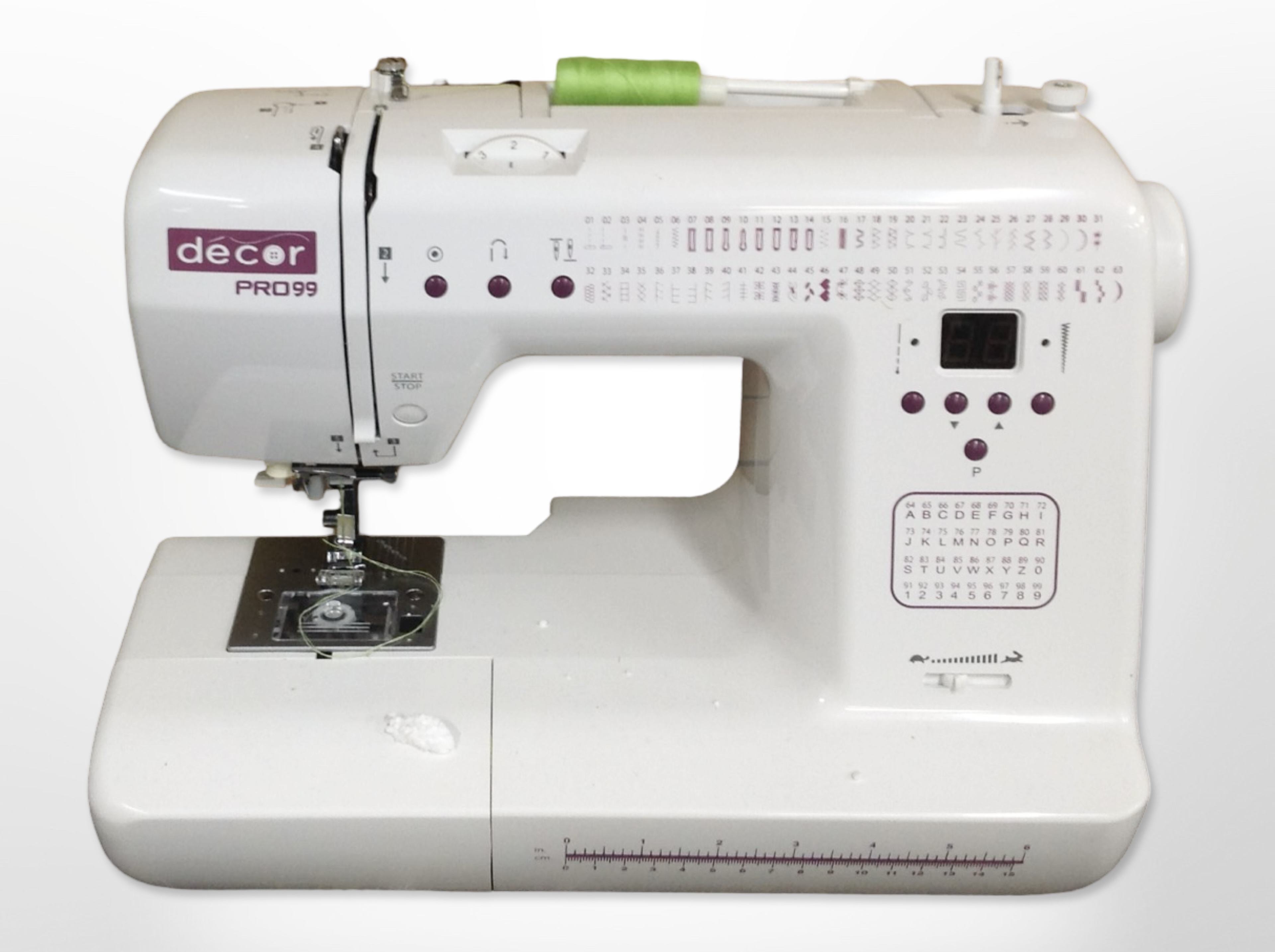 A Decor Pro 99 electric sewing machine with lead and pedal.