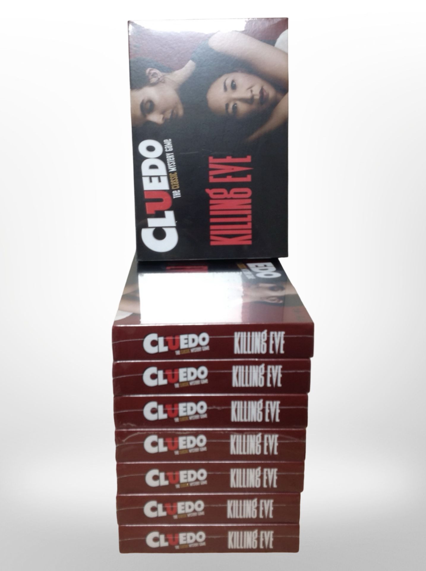 Eight Cluedo Killing Eve Edition board games, all sealed in cellophane.