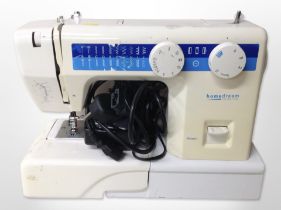 A Homedream electric sewing machine with lead and pedal.