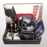 A collection of breweryana including trays, bottles of ale, pub ash trays bearing advertising,