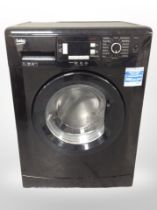 A Beko 7kg washing machine.