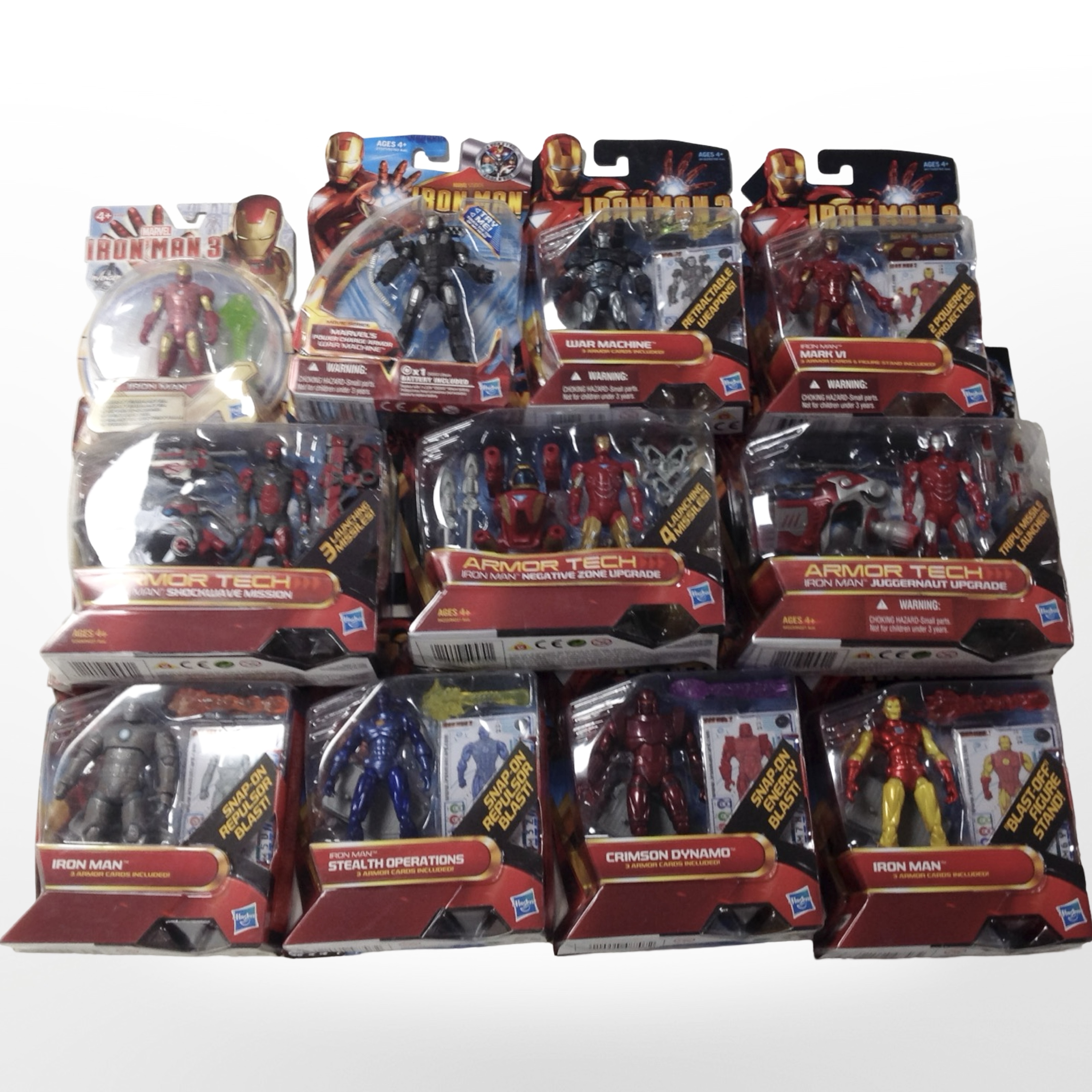 11 Hasbro Iron Man 2 and Iron Man 3 figurines, boxed.