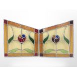 A pair of leaded stained glass panels,